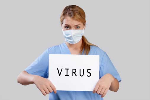 nurse covering mouth with mask inscribed  virus on it=
